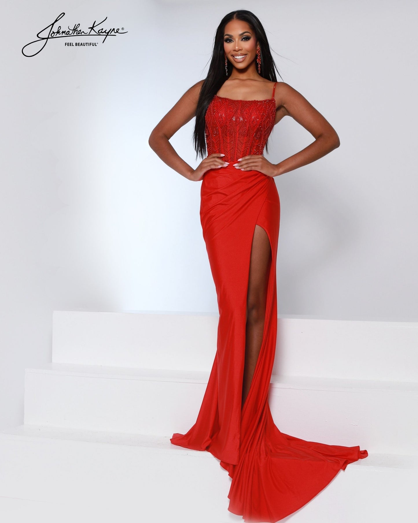 Designer: Johnathan Kayne — Style 3247
Designed in stretch knit fabrics, Johnathan Kayne style 3247 is a body-conscious long prom dress that offers both comfort and style. The stretchy construction allows the dress to move with you, making it a great option for pageant, prom, or any event where a fitted gown with flexibility is desired.

Sizes: 000, 00, 0, 2, 4, 6, 8, 10, 12, 14, 16
Colors: Black/White, Red