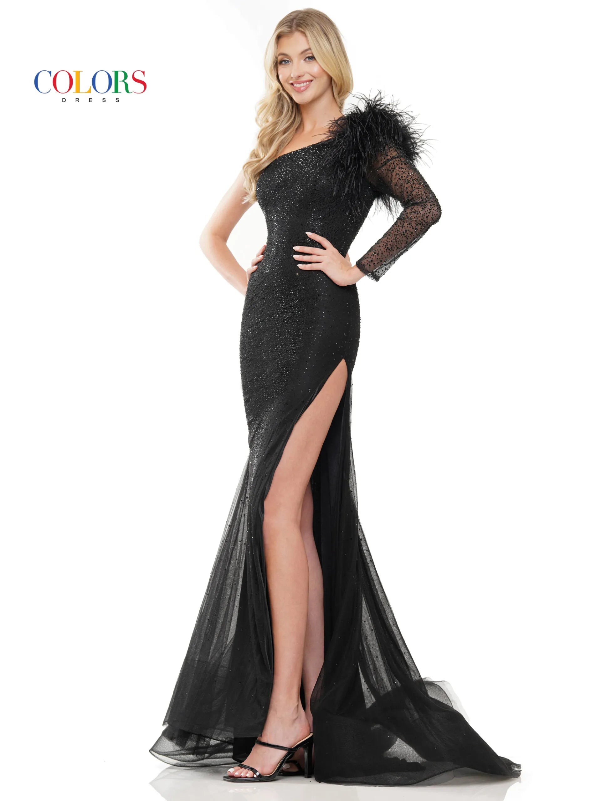 This Colors Dress 3251 one shoulder long sleeve feather prom dress will make you stand out at any formal event. The high slit and sheer feather details add a touch of elegance, while the crystal embellishments add a touch of sparkle. Perfect for those who want to make a statement with their fashion choices.  Sizes: 0-22  Colors: Black, Royal, Deep Green, Hot Pink