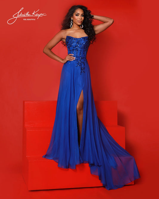 Designer: Johnathan Kayne — Style 3256
Style 3256 is a flowy Johnathan Kayne long prom dress crafted from lightweight special occasion fabrics for beautiful movement. The skirt glides effortlessly with every step, creating an elegant pageant dress silhouette that photographs beautifully and stands out on stage or on the dance floor.

Sizes: 000, 00, 0, 2, 4, 6, 8, 10, 12, 14, 16
Colors: Black, Emerald, Red, Royal