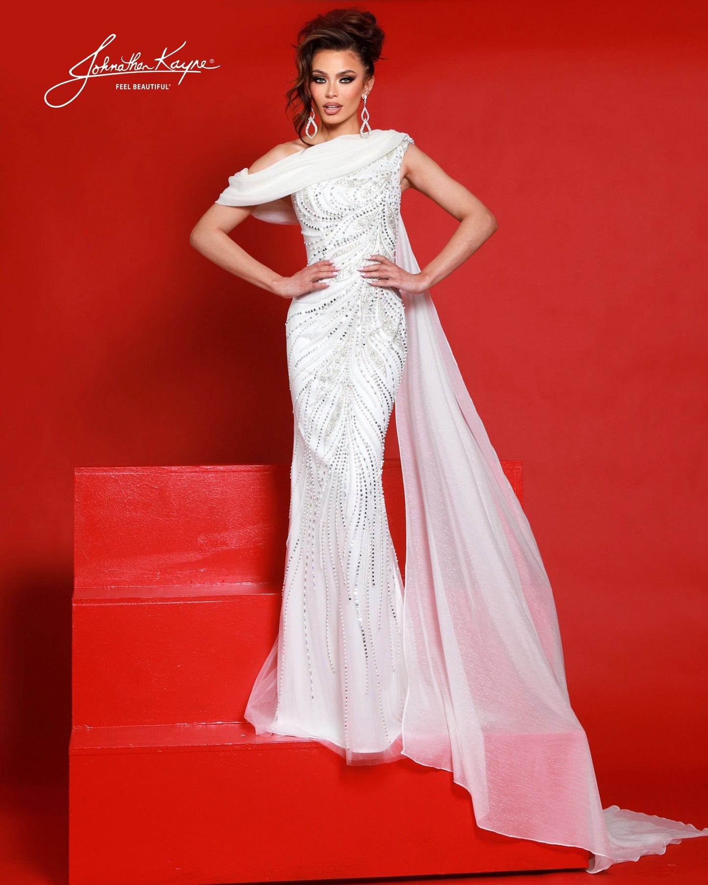 Designer: Johnathan Kayne — Style 3260
Style 3260 is a flowy Johnathan Kayne long prom dress crafted from lightweight special occasion fabrics for beautiful movement. The skirt glides effortlessly with every step, creating an elegant pageant dress silhouette that photographs beautifully and stands out on stage or on the dance floor.

Sizes: 000, 00, 0, 2, 4, 6, 8, 10, 12, 14, 16
Colors: Aqua, White