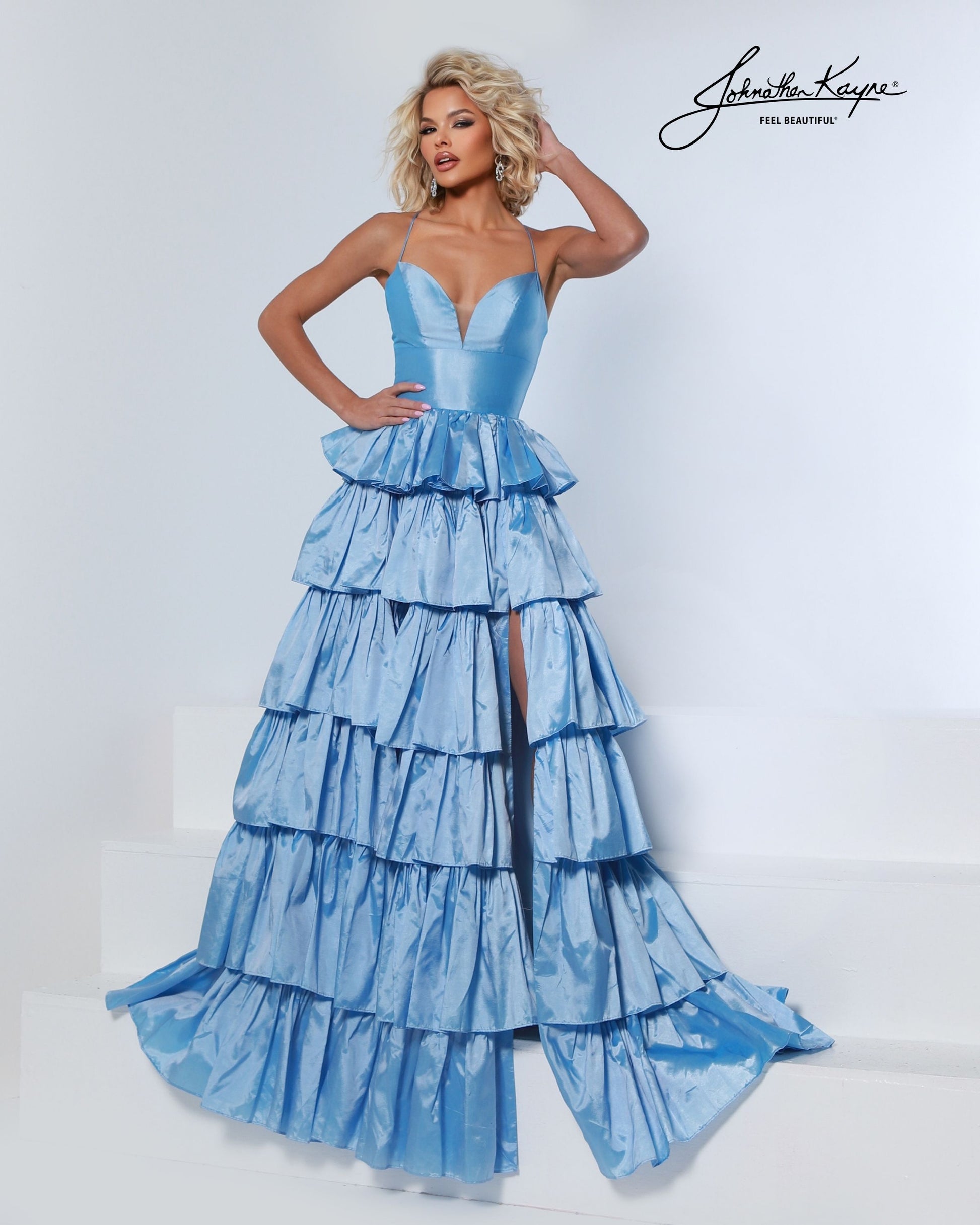 Designer: Johnathan Kayne — Style 3263
Johnathan Kayne style 3263 is a sleek long prom dress in a smooth, structured fabric that highlights the natural shape of the body. The clean lines and refined details make this gown a versatile choice for prom, pageant, and evening occasions that call for a polished, modern gown.

Sizes: 000, 00, 0, 2, 4, 6, 8, 10, 12, 14, 16
Colors: Cherry, Green Apple, Powder Blue