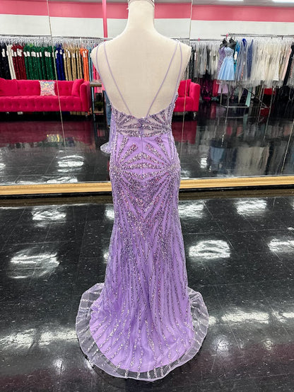 Elevate your evening with the Nina Canacci 3267, a size 4 lilac gown that exudes elegance. This formal dress features intricate beading and sequins that catch the light beautifully, complemented by a flattering V-neckline and a graceful slit for added allure. Perfect for prom, pageants, or any special occasion where sophistication is key.

Size: 4

Color: Lilac