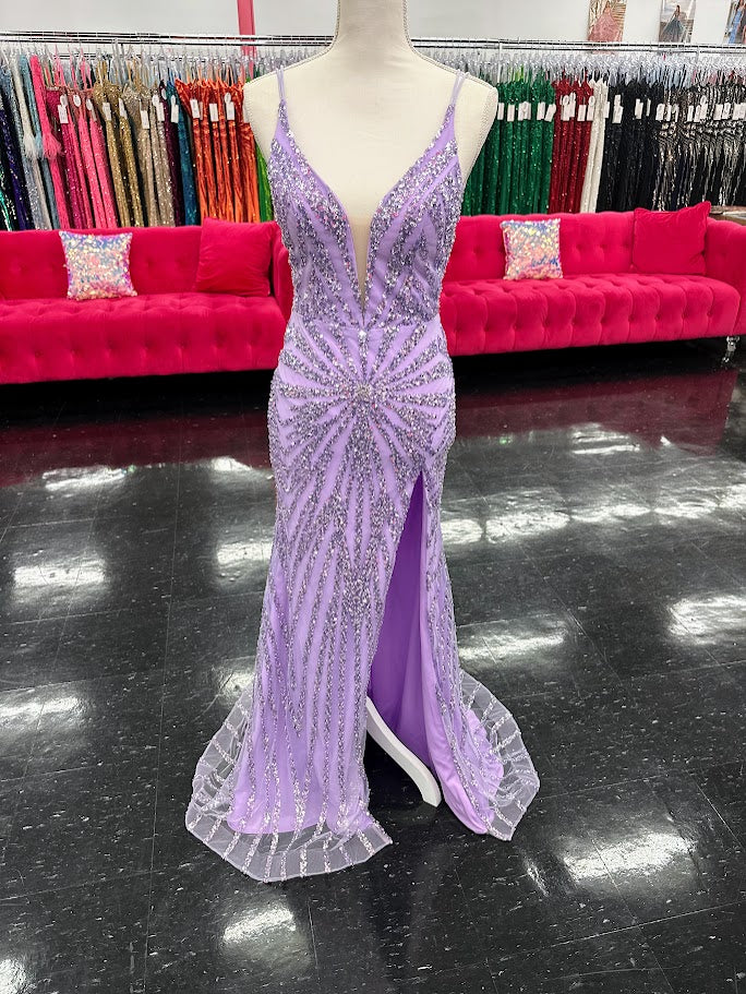 Elevate your evening with the Nina Canacci 3267, a size 4 lilac gown that exudes elegance. This formal dress features intricate beading and sequins that catch the light beautifully, complemented by a flattering V-neckline and a graceful slit for added allure. Perfect for prom, pageants, or any special occasion where sophistication is key.

Size: 4

Color: Lilac