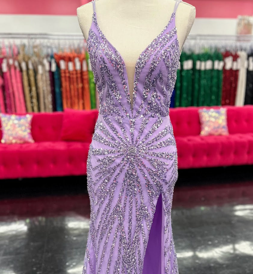 Elevate your evening with the Nina Canacci 3267, a size 4 lilac gown that exudes elegance. This formal dress features intricate beading and sequins that catch the light beautifully, complemented by a flattering V-neckline and a graceful slit for added allure. Perfect for prom, pageants, or any special occasion where sophistication is key.

Size: 4

Color: Lilac
