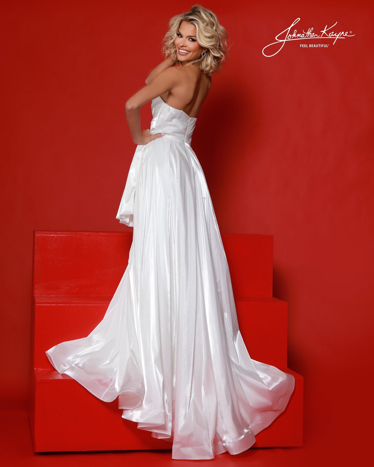 Designer: Johnathan Kayne — Style 3272
Style 3272 is a flowy Johnathan Kayne long prom dress crafted from lightweight special occasion fabrics for beautiful movement. The skirt glides effortlessly with every step, creating an elegant pageant dress silhouette that photographs beautifully and stands out on stage or on the dance floor.

Sizes: 000, 00, 0, 2, 4, 6, 8, 10, 12, 14, 16
Colors: Ice Pink, Iris, Soft White