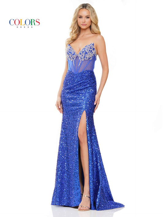 Look stunning in the Colors Dress 3274 Prom Dress. The sheer, beaded corset highlights a peak point v neckline while the sequin fitted silhouette and ruched gown add elegance. With a slit to show off your legs, this dress is perfect for any special occasion.  Sizes: 0-20  Colors: Black, Red, Royal, Deep Green