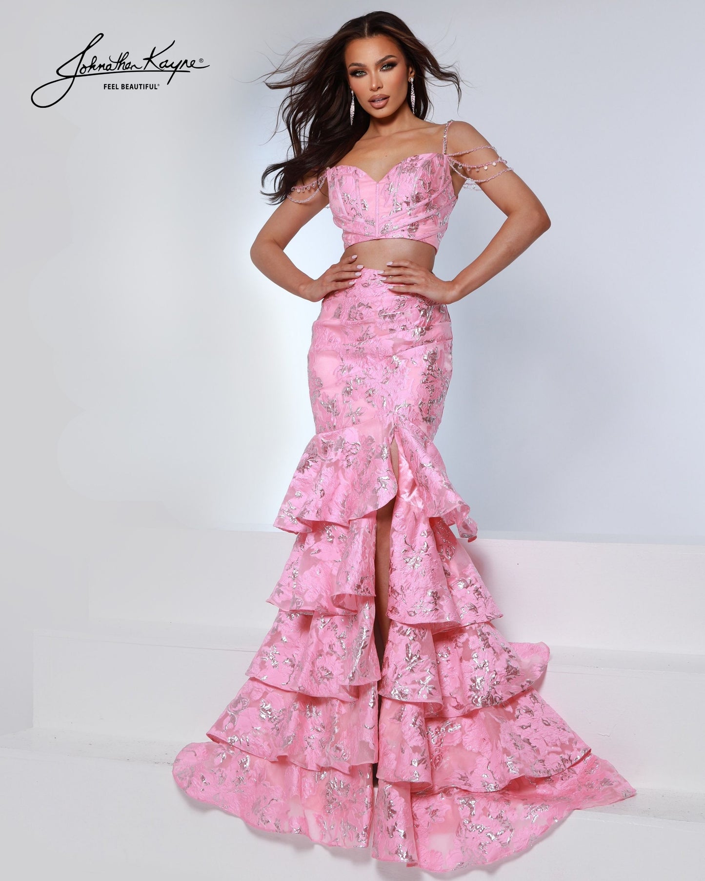 Designer: Johnathan Kayne — Style 3274
Style 3274 is a flowy Johnathan Kayne long prom dress crafted from lightweight special occasion fabrics for beautiful movement. The skirt glides effortlessly with every step, creating an elegant pageant dress silhouette that photographs beautifully and stands out on stage or on the dance floor.

Sizes: 000, 00, 0, 2, 4, 6, 8, 10, 12, 14, 16
Colors: Metallic Blue, Metallic Pink