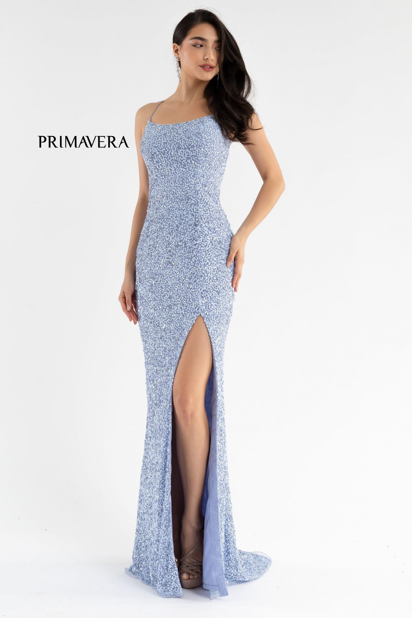 Primavera Couture 3290 This prom dress adds a pop to the multi sequins dress.  With a scoop neckline and spaghetti straps that cross and tie in the back.  This long evening dress has a side slit. And need I say, NEON!  Available Colors: Midnight, Emerald, Turquoise, Plum, Peach, Blue, Black, Fuchsia, Cream, Neon Sage, Neon Coral, Neon Lilac, Bright Blue, Rose, Neon Pink, Orange, Baby Pink, Purple, Royal Blue, Ivory, Gold, Charcoal, Red, Apple Green, Forrest Green, Yellow, Mint  Available sizes:  18, 20, 22