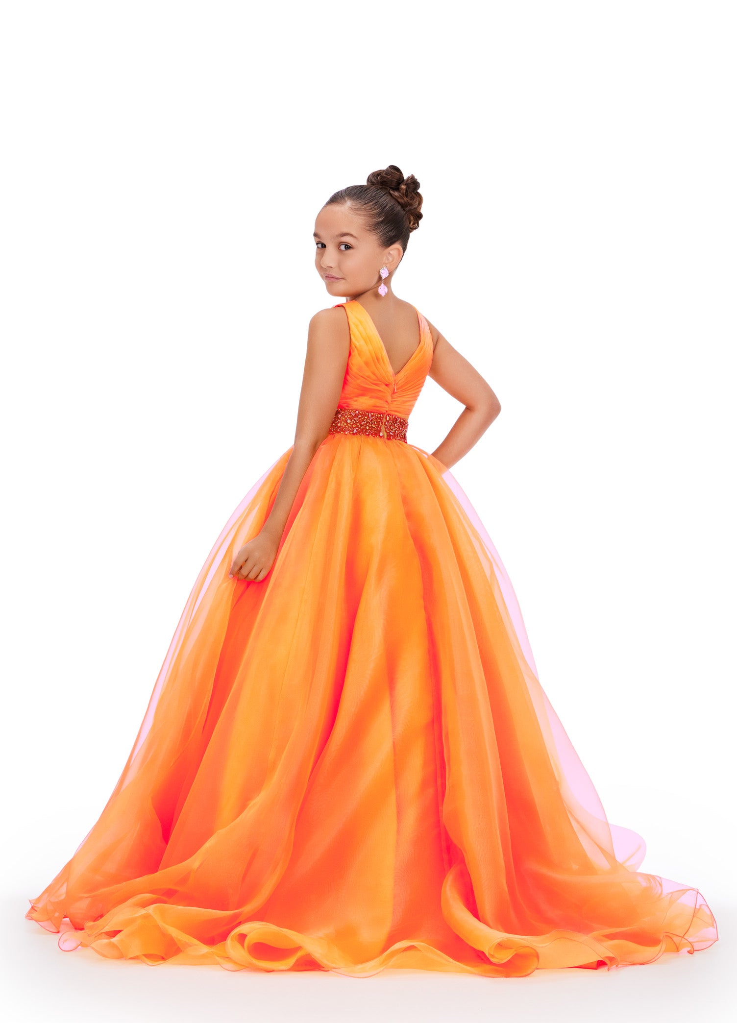 Expertly designed for young pageant contestants, the Ashley Lauren Kids 8249 dress combines a classic A-line silhouette with a modern V-neckline and sparkling crystal belt. Made from luxurious organza fabric, this dress is both elegant and comfortable, ensuring your child will look and feel their best on stage.