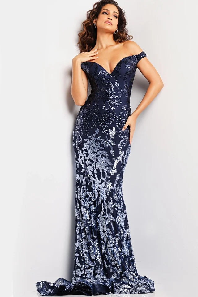 The Jovani 36370 is an exquisite formal prom dress designed to make a statement at any special occasion. Crafted with stretch tulle, the dress offers a fitted silhouette that accentuates the wearer's figure while providing comfort and ease of movement. The dress is adorned with sequin embellishments, adding a touch of glamour and sparkle to the overall look.