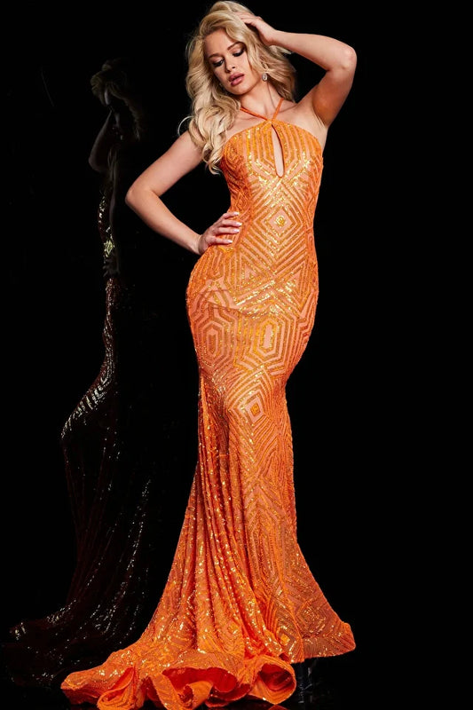The Jovani 36640 is a striking formal gown that combines modern sophistication with eye-catching details. This fitted-style dress is crafted from luxurious mesh material, creating a sleek and elegant look. The dress is embellished with sequins, adding a touch of sparkle and creating a captivating effect. The floor-length gown features a train that enhances the overall glamour and drama, making it a perfect choice for formal events.