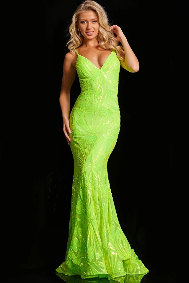 The Jovani 36656 is a captivating formal prom dress made from mesh, creating a fitted silhouette that gracefully enhances the wearer's figure. The dress is intricately detailed with sequin embellishments, adding a dazzling and eye-catching element to its overall design. With a floor-length hem, the gown features a horsehair trim that imparts structure and volume, contributing to its elegant aesthetic. 
