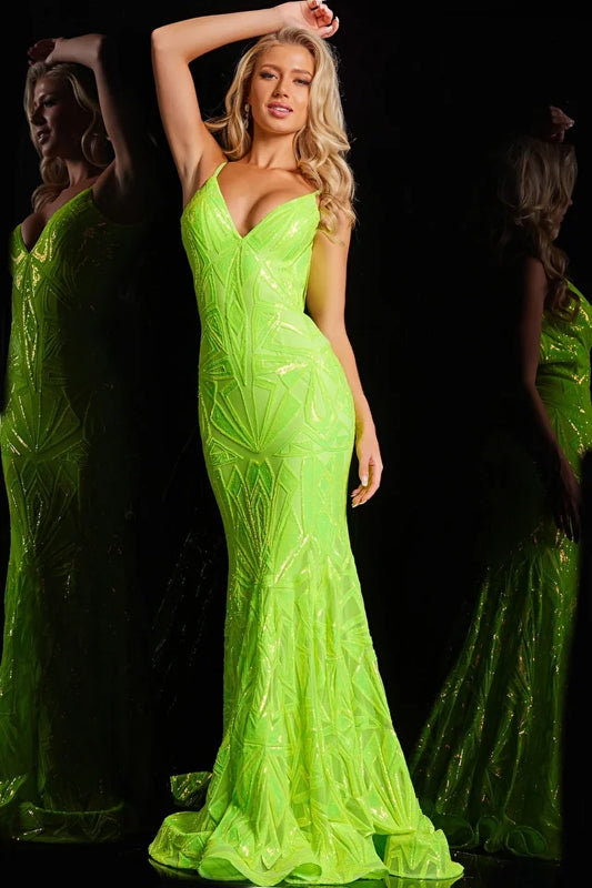 The Jovani 36656 is a captivating formal prom dress made from mesh, creating a fitted silhouette that gracefully enhances the wearer's figure. The dress is intricately detailed with sequin embellishments, adding a dazzling and eye-catching element to its overall design. With a floor-length hem, the gown features a horsehair trim that imparts structure and volume, contributing to its elegant aesthetic. 