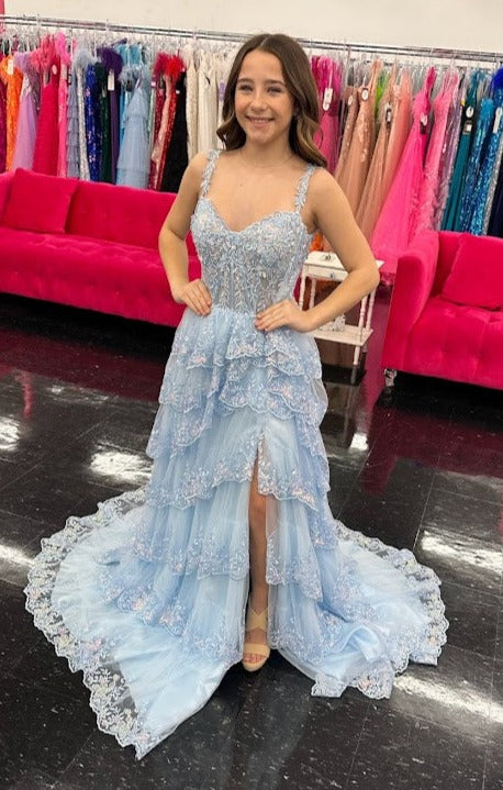 The Jovani 36687 is a breathtaking prom dress that belongs to the formal collection, designed to make a lasting impression at any special occasion. This enchanting gown is made from delicate tulle, a fabric known for its ethereal and lightweight quality.  The dress is fashioned in a classic A-line style, which is universally flattering and never goes out of fashion. Its attention to detail sets it apart.