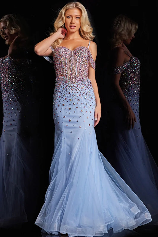 The Jovani 36730 is a striking formal gown designed to make a bold statement at your special event. It is crafted from tulle, which provides a soft and ethereal feel, draping beautifully to add an element of grace to your look. This dress is styled as a mermaid gown, known for its curve-enhancing silhouette that flares out dramatically at the bottom. One of its standout features is the horsehair trim, which adds structure to the mermaid skirt, allowing it to maintain its shape beautifully. 