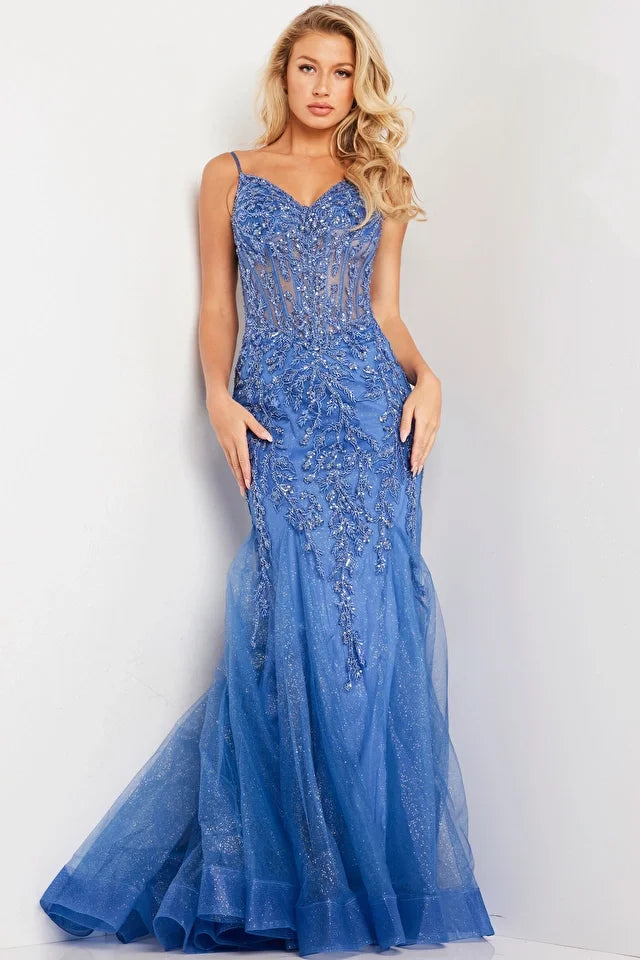 The Jovani 37416 is a stunning formal gown designed to make a fashionable and glamorous statement at special occasions. Crafted from glitter tulle, this fabric adds shimmer and luxury to the dress. The mermaid-style design of the dress is known for its flattering and captivating silhouette, hugging the body and flaring out at the bottom. The gown features intricate embroidery that is embellished with sequins, creating a dazzling and eye-catching look that adds a touch of glamour and opulence to the design.