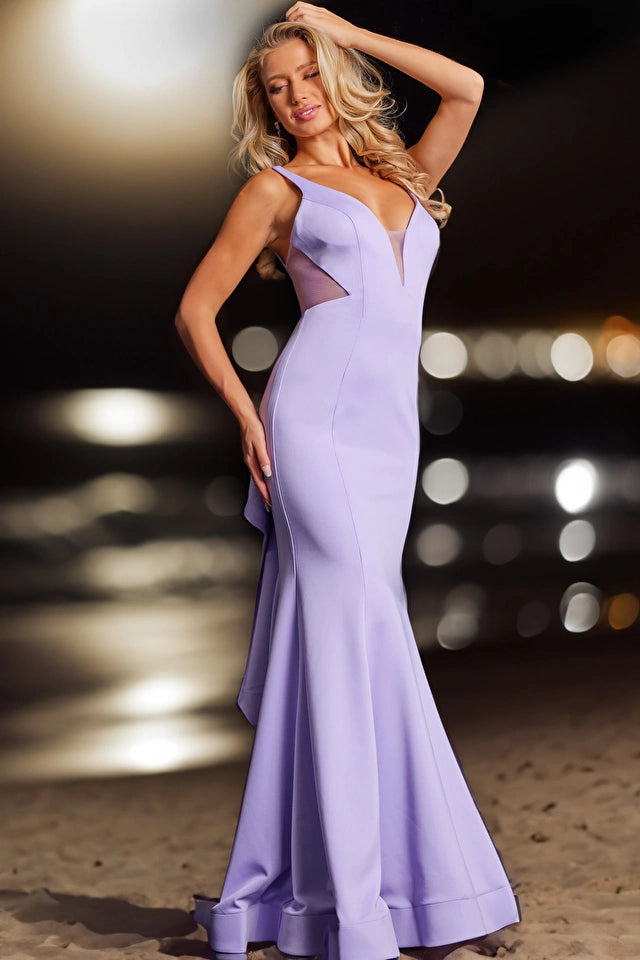 The Jovani 37430 is a stunning formal gown that exudes glamour and sophistication. This fitted-style dress is crafted from luxurious satin, offering a sleek and elegant look that is perfect for formal occasions.  The dress features a flare bottom and train, creating a dramatic and flowing silhouette that adds an element of glamour to the ensemble. 