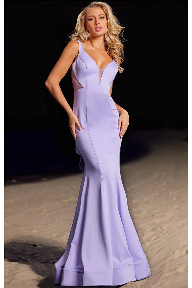 The Jovani 37430 is a stunning formal gown that exudes glamour and sophistication. This fitted-style dress is crafted from luxurious satin, offering a sleek and elegant look that is perfect for formal occasions.  The dress features a flare bottom and train, creating a dramatic and flowing silhouette that adds an element of glamour to the ensemble. 