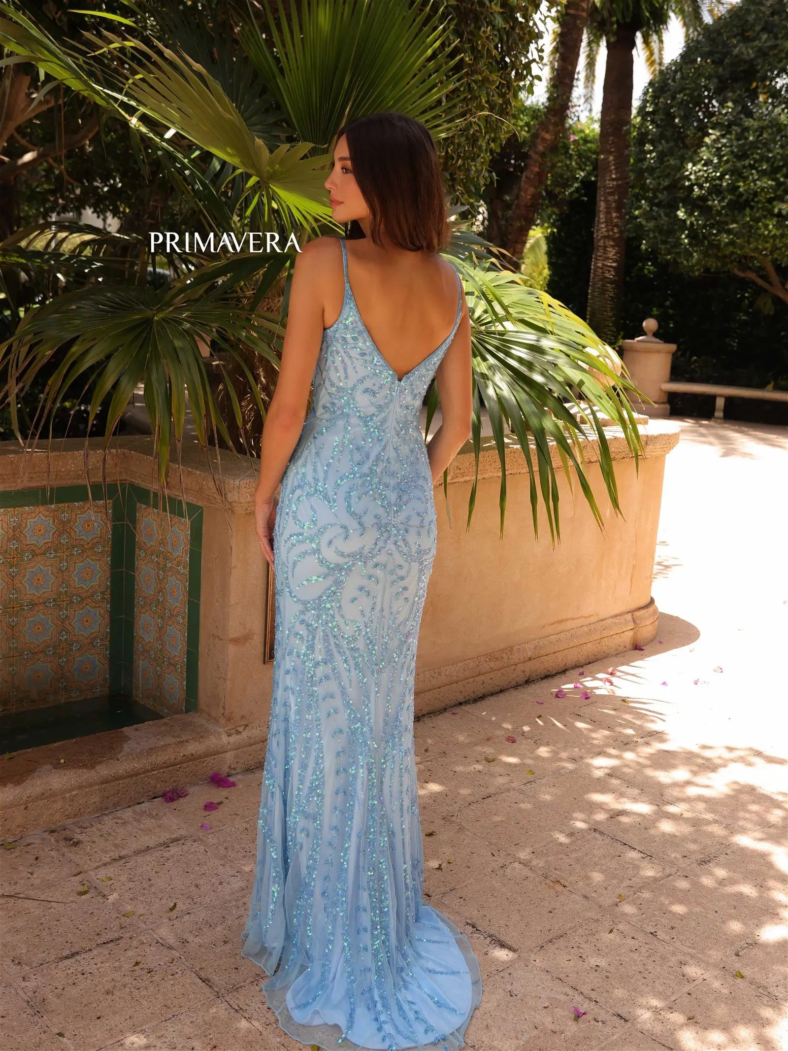 Primavera Couture 3793 This is a fully sequined long fitted Evening Gown with a V Neckline and a Sweeping Train.  This dress is an excellent choice for your special evening event such as prom or pageant.   Available colors:  Crystal Blue  Available sizes:  8