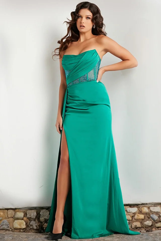The Jovani 38330 prom dress is a captivating masterpiece, meticulously designed to make you the center of attention at any formal event. Crafted from luxurious stretch satin, this gown boasts a mesmerizing combination of elements that will leave a lasting impression. Its silhouette is a sleek sheath design, tailored to accentuate your figure with a graceful and body-hugging fit. 