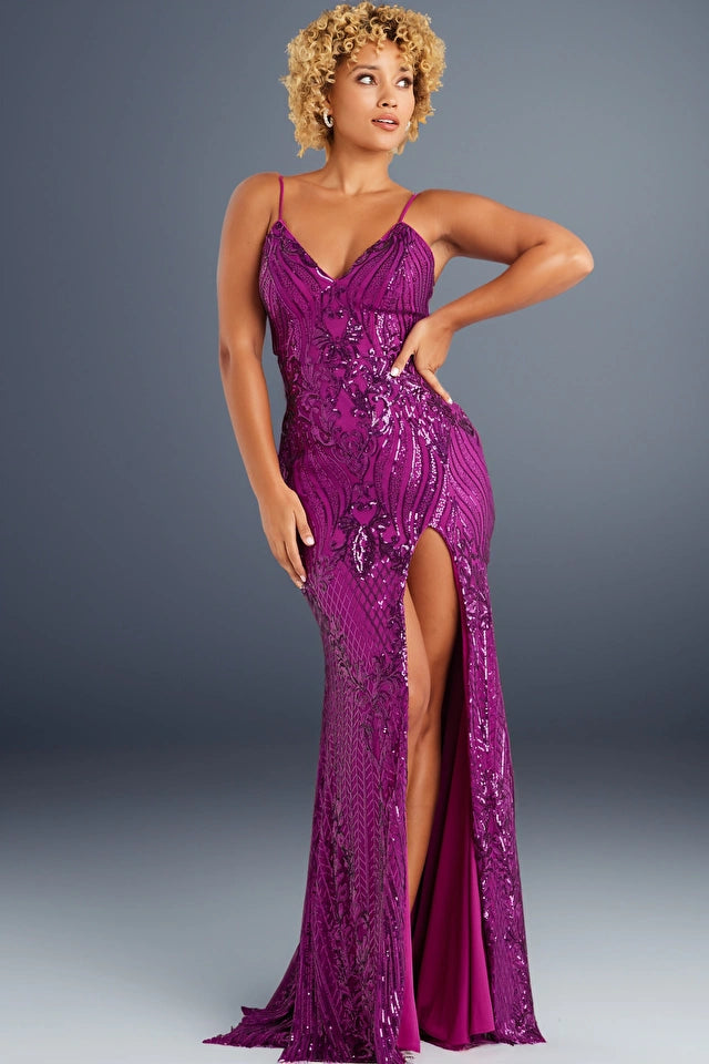 The Jovani 38337 prom dress, part of the formal collection, is an enchanting and glamorous gown designed to make a statement at any prom or formal event. Crafted from shimmering sequin-covered mesh, this dress offers a fitted silhouette that hugs the curves gracefully. The sequin pattern adds a touch of sparkle and sophistication to the overall look.  This floor-length dress features a high slit that adds a dash of allure and allows for ease of movement while showcasing your legs. 