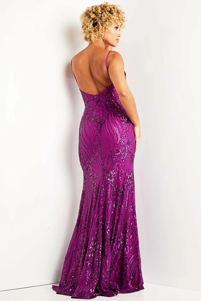 The Jovani 38337 prom dress, part of the formal collection, is an enchanting and glamorous gown designed to make a statement at any prom or formal event. Crafted from shimmering sequin-covered mesh, this dress offers a fitted silhouette that hugs the curves gracefully. The sequin pattern adds a touch of sparkle and sophistication to the overall look.  This floor-length dress features a high slit that adds a dash of allure and allows for ease of movement while showcasing your legs. 