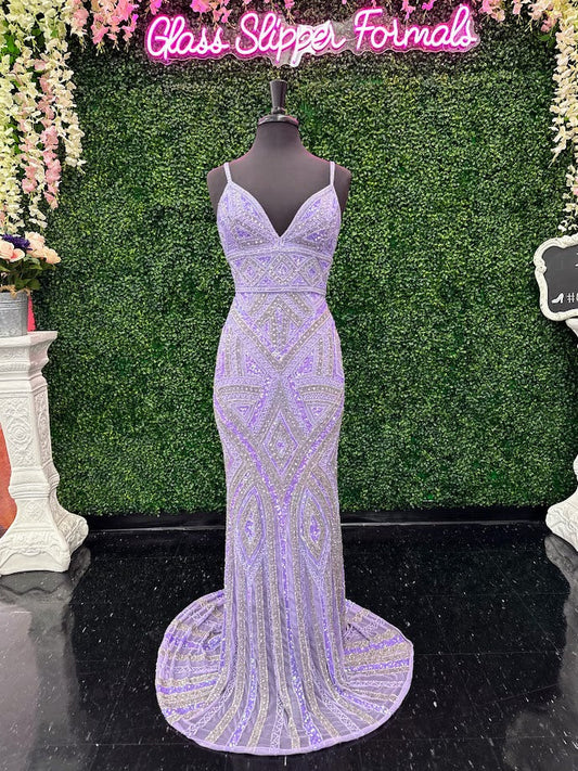 Dazzle in the Jovani 38848 Long Beaded Sequin Prom Dress. The corset bodice and V-neckline give a flattering fit while the Beading &amp; sequins details add a touch of glamour. Fringe beaded corset tassels. Perfect for prom, pageants, or any formal occasion.  Sizes: 00-24  Colors: Blush/Silver, Lilac/Silver