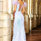 Ava Presley 38892 Long Fitted Sequin Lace Pageant Gown. Off the Shoulder Feather Accented strap. This Prom Dress Features a Slit Skirt with a sweeping Train. Cutout Corset Style Back, Plunging V sweetheart neckline. This dress is perfect!  Sizes: 00-24  Colors: Iridescent Lilac, Iridescent Ocean, Neon Pink, Off White, Iridescent Blush, Red, Hot Pink