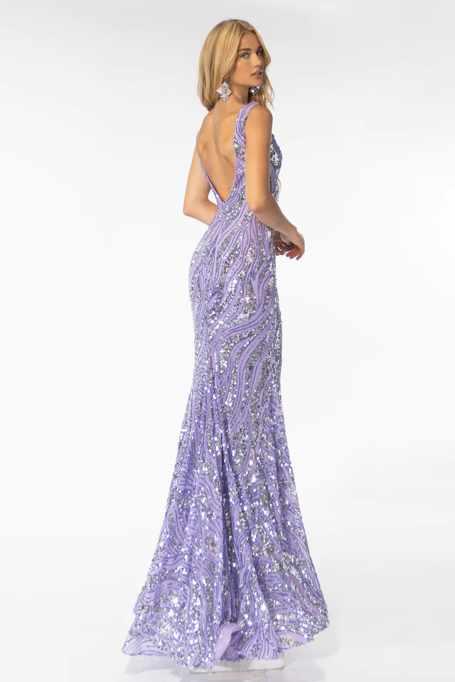 The Ava Presley 39201 gown is a stunning choice for any formal occasion. Featuring a long wave stripe motif covered in sparkling sequins, this dress is sure to make a statement. The tank bodice and sheer sides add a touch of allure, while the trumpet skirt and open back enhance your figure. A must-have for any fashion-forward individual.