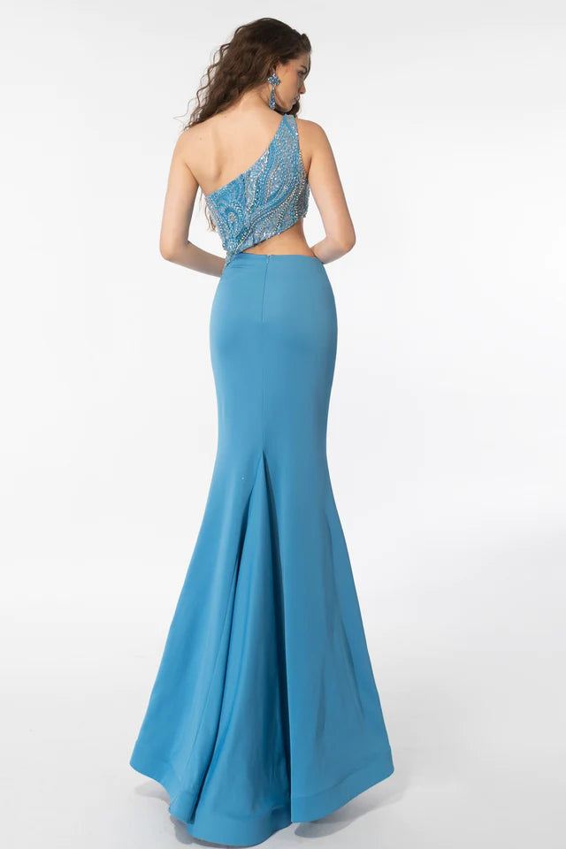 Elevate your formal look with the Ava Presley 39218 Long Prom Dress. Made with a chic one shoulder design and side cut out, this gown is adorned with beautiful beaded crystals for a touch of elegance. The mermaid silhouette accentuates your curves, making this a perfect choice for a pageant or prom.