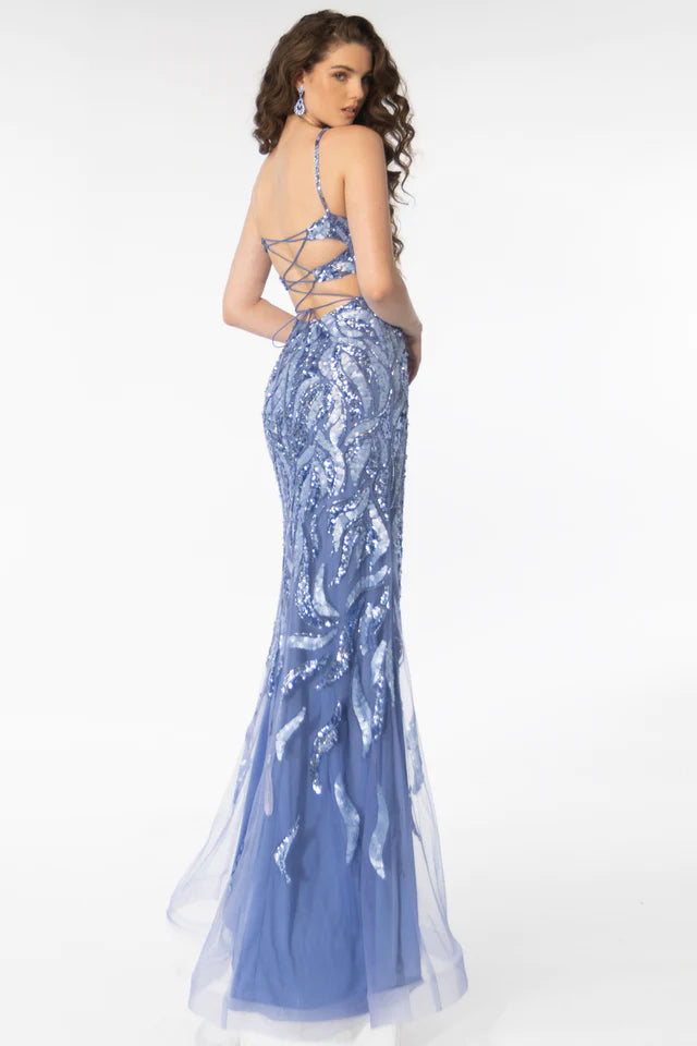 The Ava Presley 39220 Long Prom Dress is a stunning choice for your special occasion. Featuring a sleeveless fitted design with intricate sequin detailing, this dress will make you stand out. The sheer V neckline adds a touch of elegance, making it perfect for formal events like pageants.
