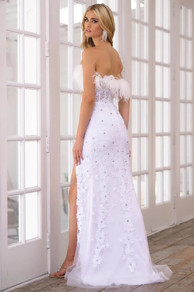 Elevate your formalwear with the Ava Presley 39231 Long Prom Dress. The strapless corset bodice and high slit skirt offer a flattering silhouette, while the delicate beading and feather details provide a touch of elegance. Perfect for pageants and formal events.