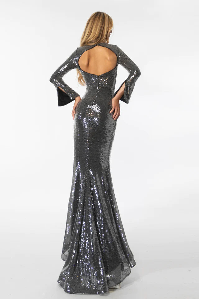 Expertly crafted with a high slit and scoop neckline, the Ava Presley Long Sleeve Prom Gown exudes elegance and glamour. The sequin details add the perfect touch of sparkle for any formal event or pageant. Embrace the confidence that comes with wearing this stunning gown.