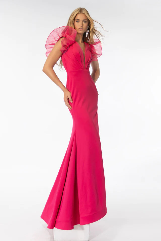 Expertly crafted for a flawless silhouette, the Ava Presley 39307 prom dress is a must-have for formal events. Crafted from thick jersey and organza, it boasts ruffle shoulder detailing that adds a touch of elegance. Make a statement with this pageant-worthy gown.