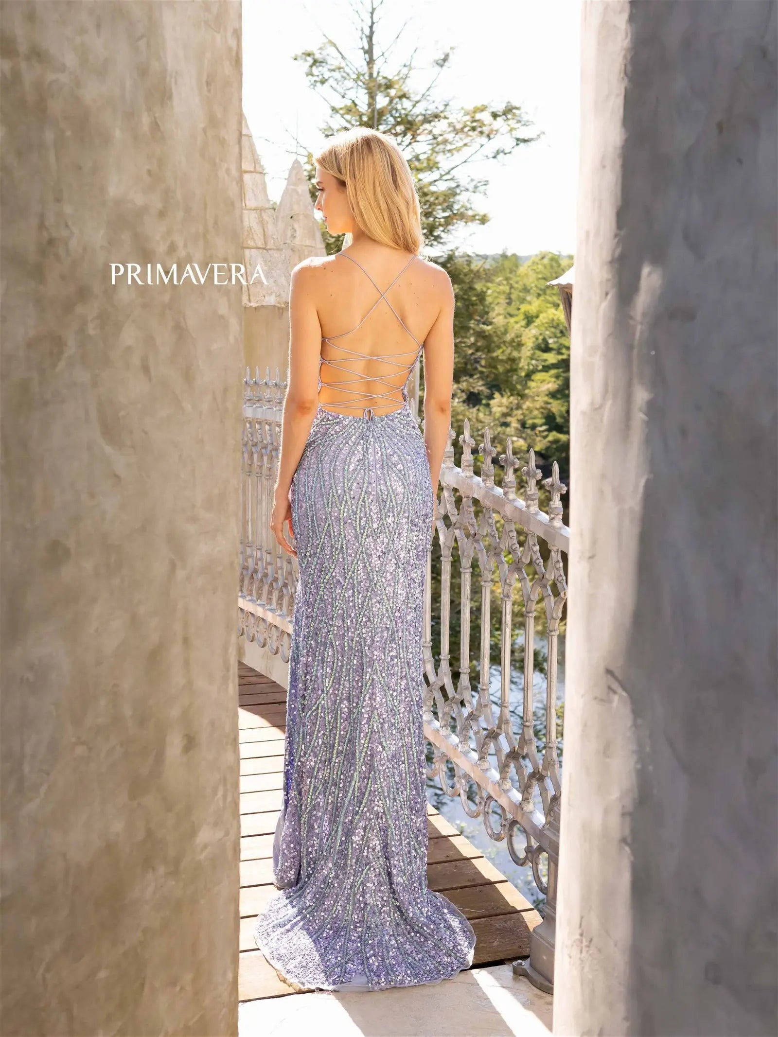 Primavera Couture 3959 Prom Dress Long Beaded Gown. This Gown has a beautiful design all over. Primavera Couture 3959 Sequin Scoop neck Prom Dress Backless Corset Slit Formal Gown  Size-000-18  Colors-Lilac, Coral