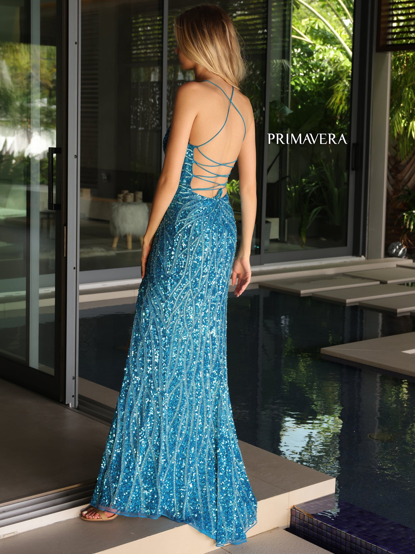 Primavera Couture 3959 Prom Dress Long Beaded Gown. This Gown has a beautiful design all over. Primavera Couture 3959 Sequin Scoop neck Prom Dress Backless Corset Slit Formal Gown  Size-000-18  Colors-Lilac, Coral, Fuchsia, Jade, Peacock, Purple 