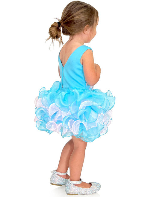 Marc Defang 5117K size 8 Turquoise girls cupcake pageant dress with pink applique on the top with crystal scattered throughout.  Multi blue and pink ruffle skirt.  Size 8  Color: Turquoise