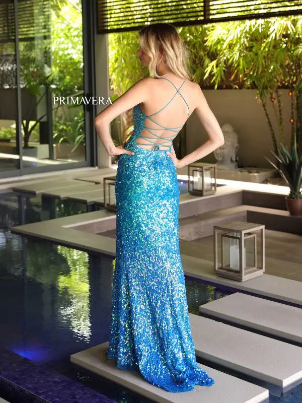 Elevate your prom look with the Primavera Couture 4102 Long Prom Dress. The ombre sequin corset adds a touch of glamour, while the fitted scoop neck and high slit offer a flattering silhouette. Perfect for formal events and pageants. Stand out with style and comfort.