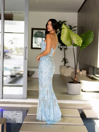 Indulge in elegance with the Primavera Couture 4108 long prom dress. The sequin fitted design features a high slit, strapless sweetheart neckline, and formal pageant gown style. You'll shine at any event in this glamorous and flattering gown.