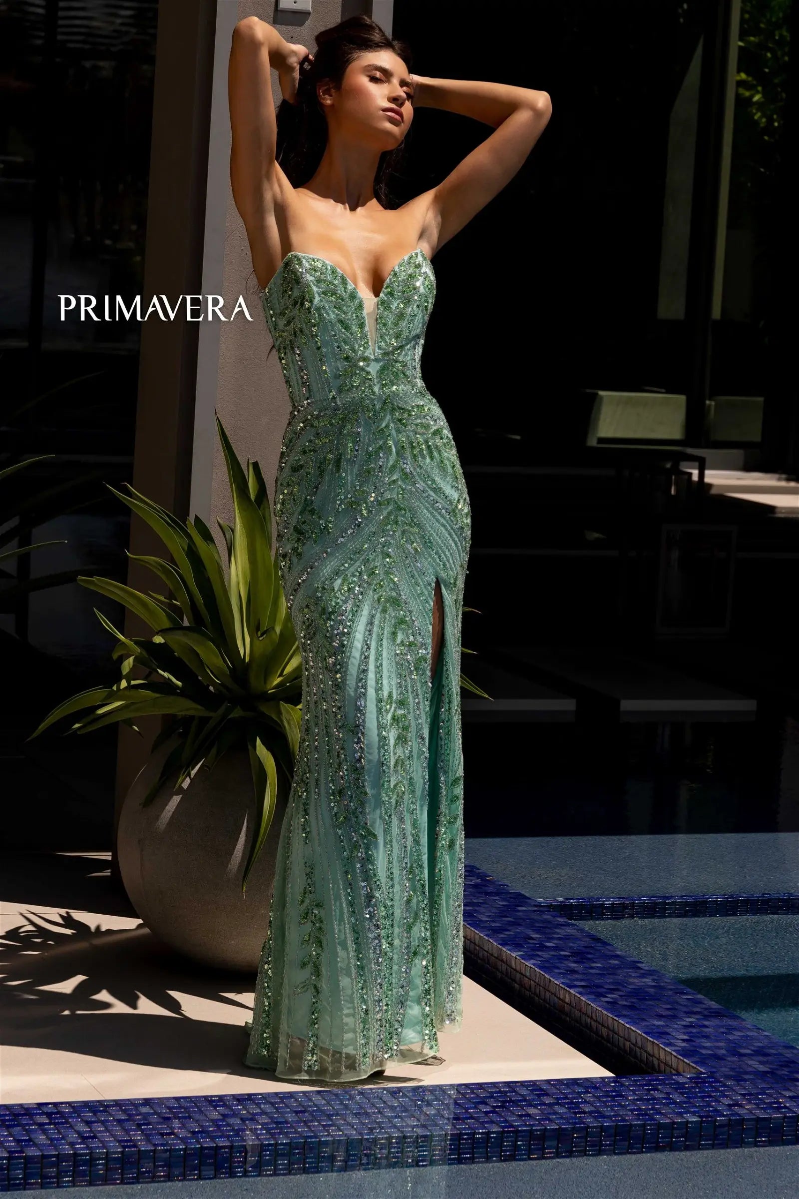 Expertly designed by Primavera Couture, the 4134 Long Prom Dress combines a sequined, fitted silhouette with a high slit and strapless design for a formal, pageant-worthy look. Stand out from the crowd with this elegant gown, perfect for a glamorous night out or special occasion.