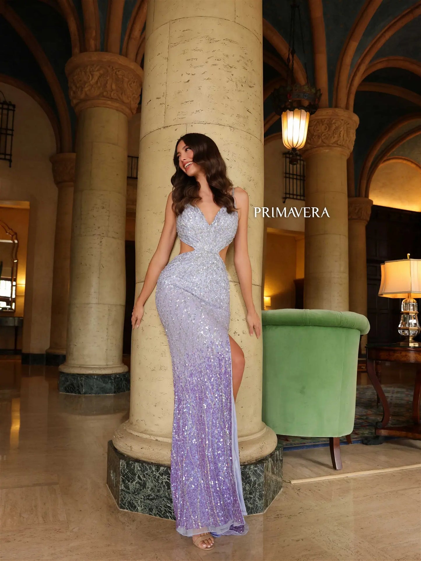 This Primavera Couture 4136 prom dress offers a stunning look with its cutout corset bodice, backless design, and ombre beaded skirt. Intricately sequined and with a daring thigh-high slit, this gown is sure to turn heads. Ideal for any special occasion.  Sizes: 000-18  Colors: Pink, Lilac, Black