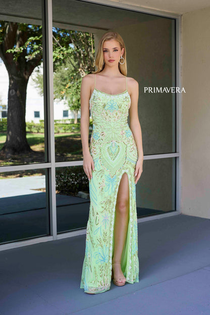 This Primavera Couture 4156 Long Prom Dress is the perfect choice for a sophisticated and glamorous look. With a fitted silhouette and scoop neck, this dress accentuates your curves while the sequin details add a touch of sparkle. The lace-up back and high slit provide a flattering and elegant touch, making it a must-have for formal occasions and pageant events.