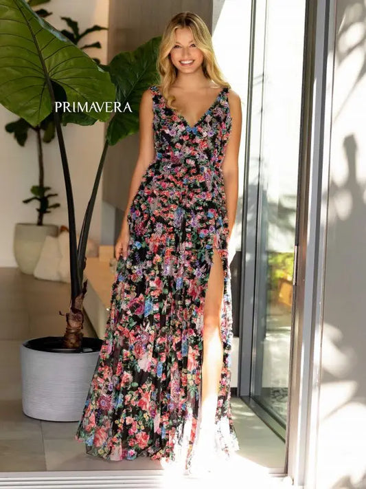 Elevate your style with the stunning Primavera Couture 4167 Long Prom Dress. This floral print gown features intricate beading, a fitted body, and a high slit for a glamorous and sophisticated look. Stand out at any formal event with this elegant and eye-catching dress.