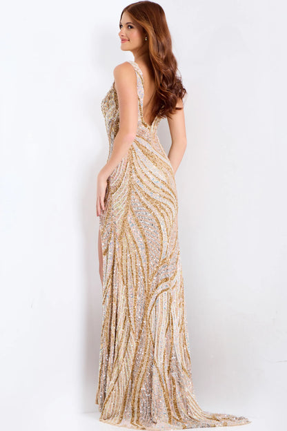 Make a statement at your special event with the Jovani 42512 Long Beaded Sequin Prom Dress. This beautiful gown features a stunning v-neckline, intricate beaded sequin detailing, and a sexy open back with a high leg slit. The mermaid silhouette will flatter your curves and make you feel confident all night long. Perfect for prom, pageants, or any formal occasion. This exquisite gown features a floor-length silhouette adorned with shimmering sequins throughout. A daring high slit accentuates the design, prov