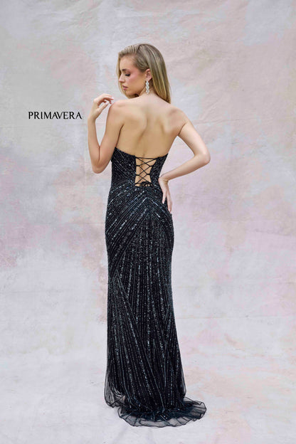 This Primavera Couture 4309 Prom Dress features intricate beading and sequin detailing, with a flattering corset silhouette and dramatic slit. Perfect for any formal occasion, this strapless gown exudes elegance and sophistication. Make a statement and turn heads with this stunning, high-quality dress.

Sizes: 000-18

Colors: Black, Nude, Peacock, Powder Blue