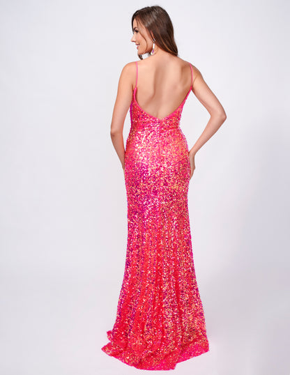 This fitted sequin long prom dress by Nina Canacci 4410 is designed to make you stand out on the dance floor. With a low back and V neck, this elegant gown features a stylish slit that will add an extra touch of sophistication to your look. Perfect for any formal occasion, this dress is sure to make you feel confident and glamorous.