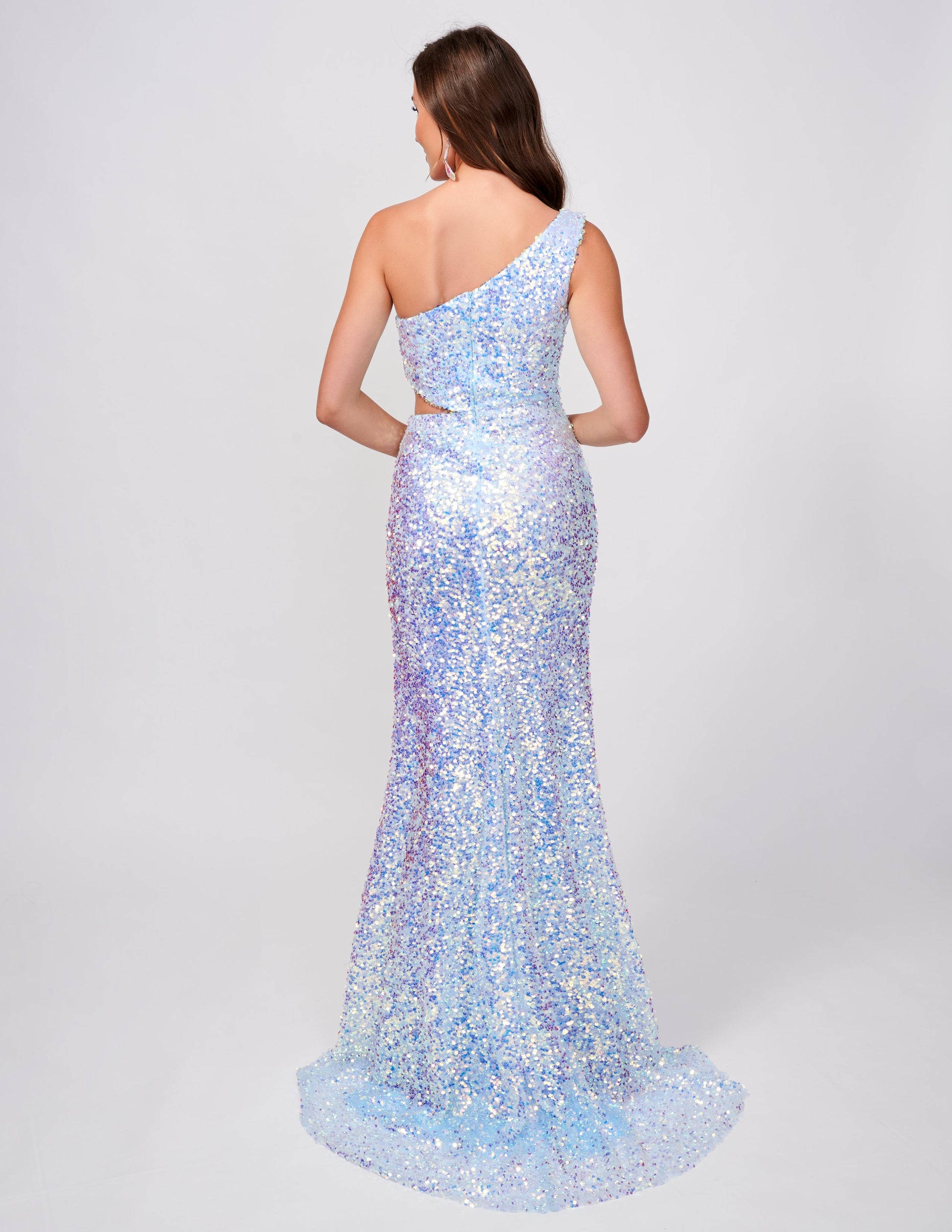<p data-mce-fragment="1">Be the center of attention in this stunning Nina Canacci 4413 sequin one shoulder prom dress. Featuring a cut out slit design, this formal gown offers a fitted silhouette for a flattering look. Perfect for any evening event, be prepared to make a statement with this elegant and modern dress.</p> <p data-mce-fragment="1">Sizes: 0-12</p> <p data-mce-fragment="1">Colors: Fuchsia, Baby Blue</p>