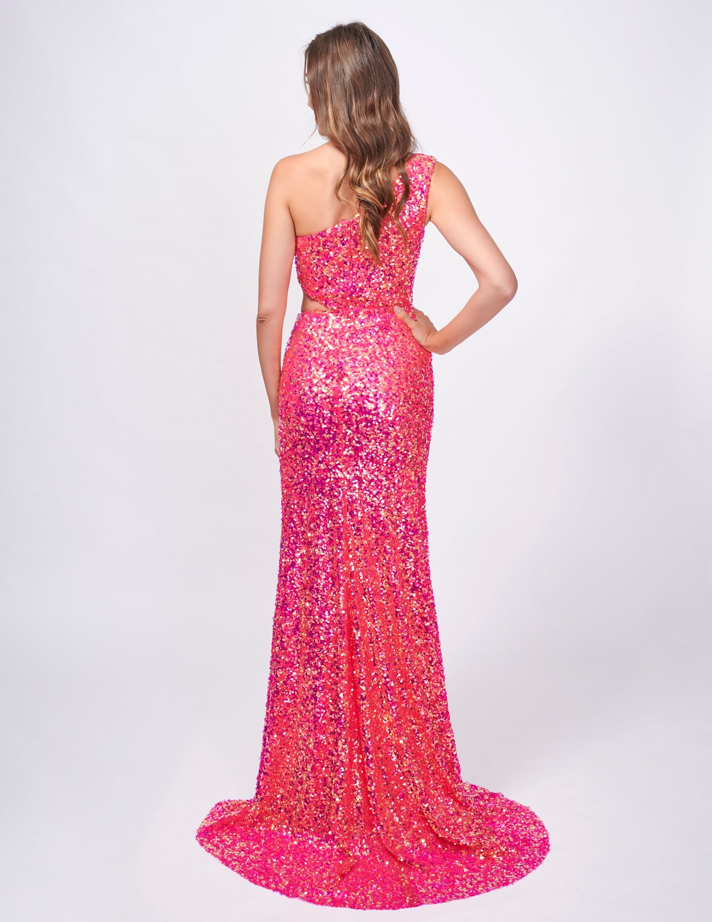 <p data-mce-fragment="1">Be the center of attention in this stunning Nina Canacci 4413 sequin one shoulder prom dress. Featuring a cut out slit design, this formal gown offers a fitted silhouette for a flattering look. Perfect for any evening event, be prepared to make a statement with this elegant and modern dress.</p> <p data-mce-fragment="1">Sizes: 0-12</p> <p data-mce-fragment="1">Colors: Fuchsia, Baby Blue</p>