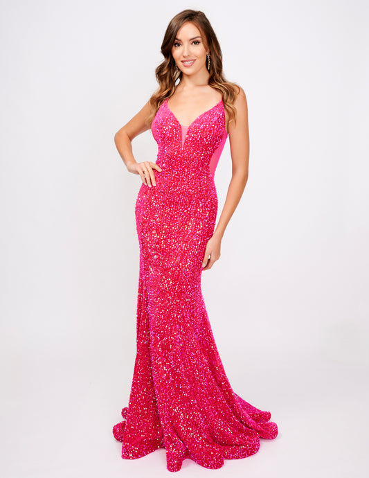 Elevate your style with the Nina Canacci 4420 Velvet Sequin Mermaid Prom Dress. Featuring a striking sheer v-neckline and stunning velvet sequin design, this formal evening gown is sure to make a statement. With its flattering mermaid silhouette, it's the perfect choice for a prom or special occasion.