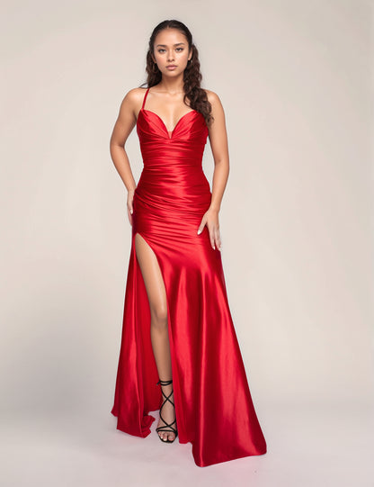 This Nina Canacci size 2 prom dress features a long, fitted silhouette crafted from luxurious satin that elegantly contours the body. The gown showcases a flattering V-neckline and a corset design for structured support and a refined shape. A daring slit adds a touch of allure, making it an ideal choice for formal events and evening occasions where sophistication meets style.

Size: 2

Color: Red